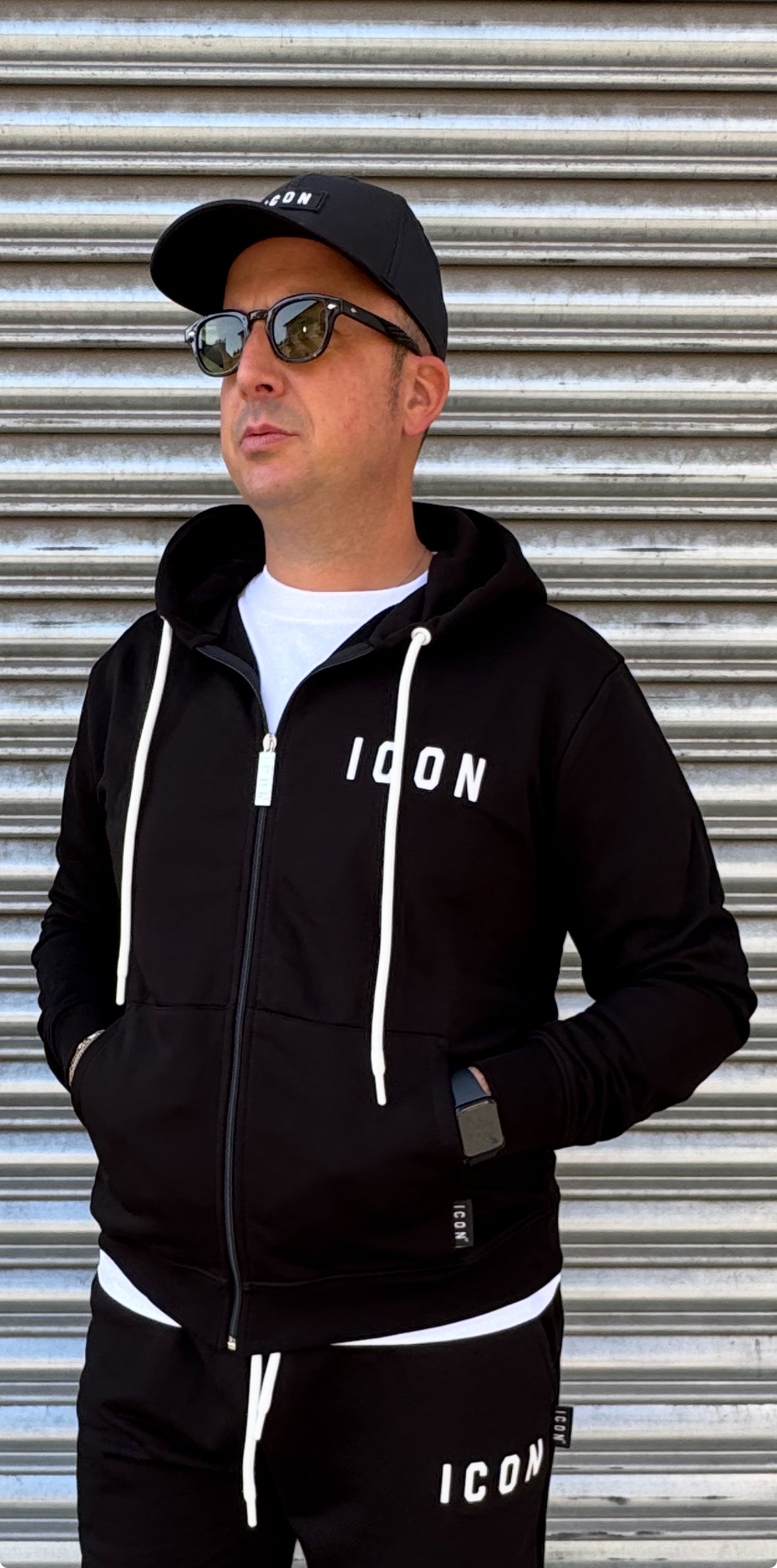 Tuta ICON con cappuccio