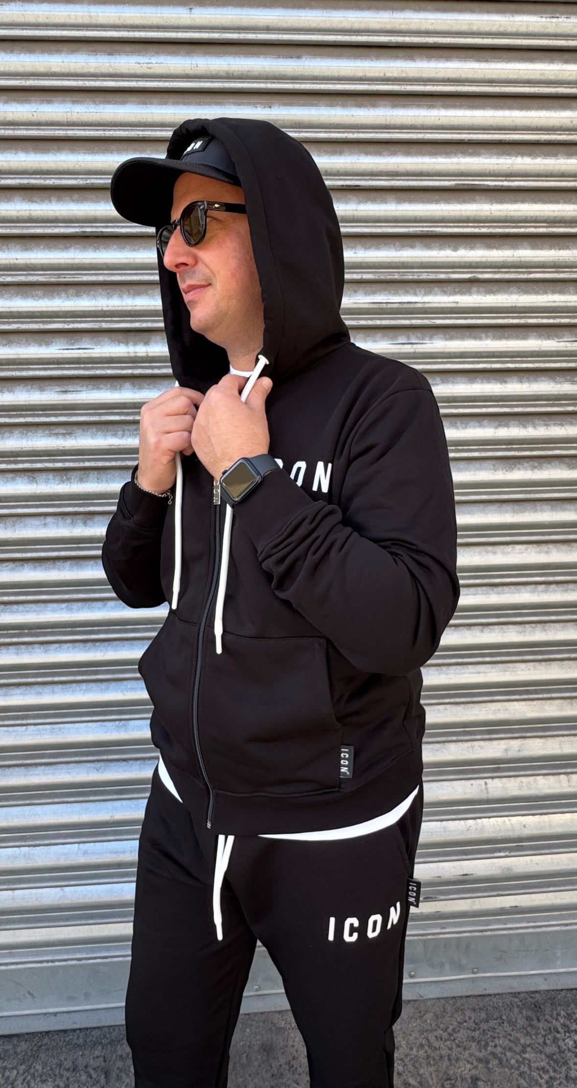 Tuta ICON con cappuccio