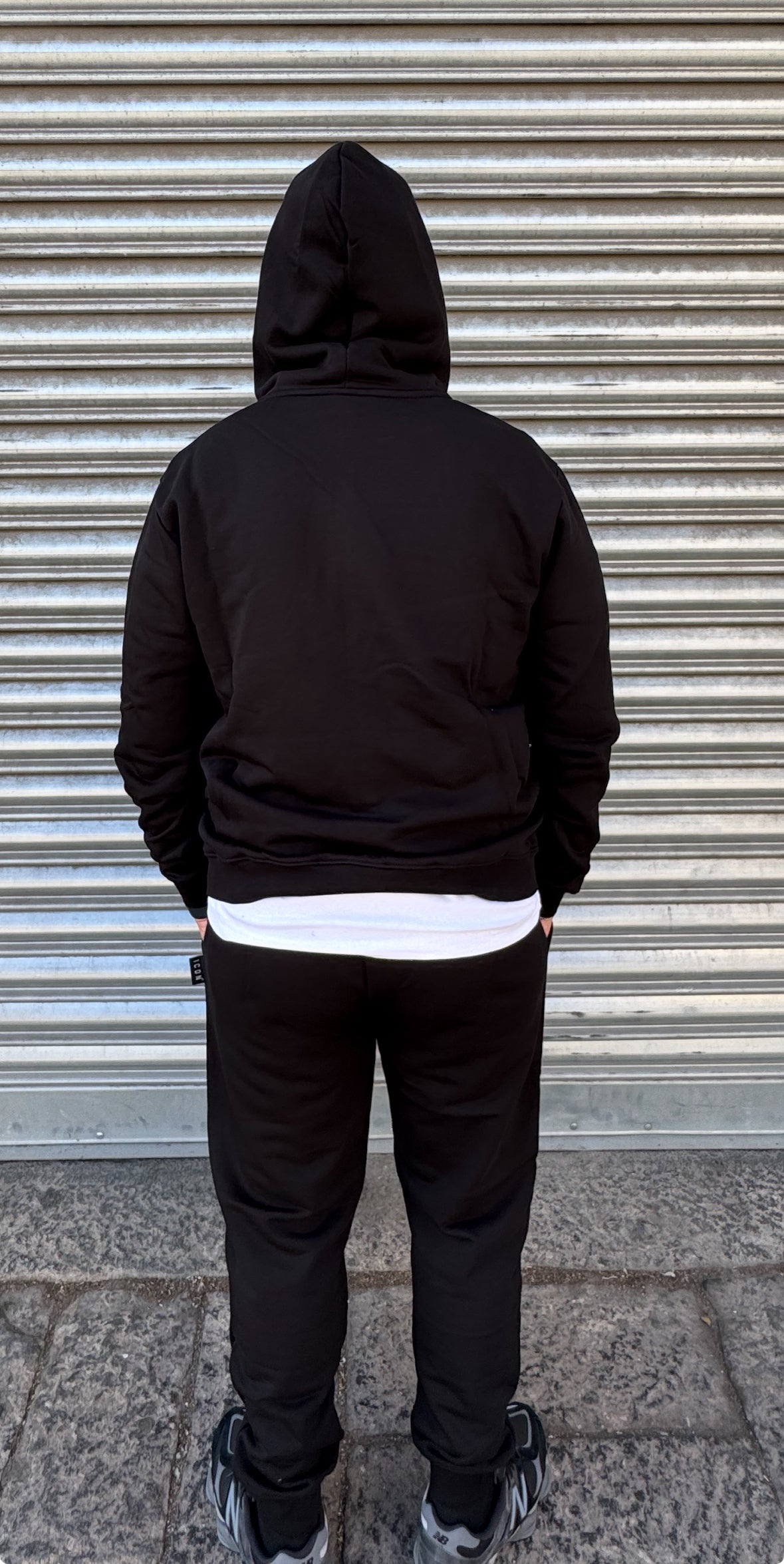 Tuta ICON con cappuccio